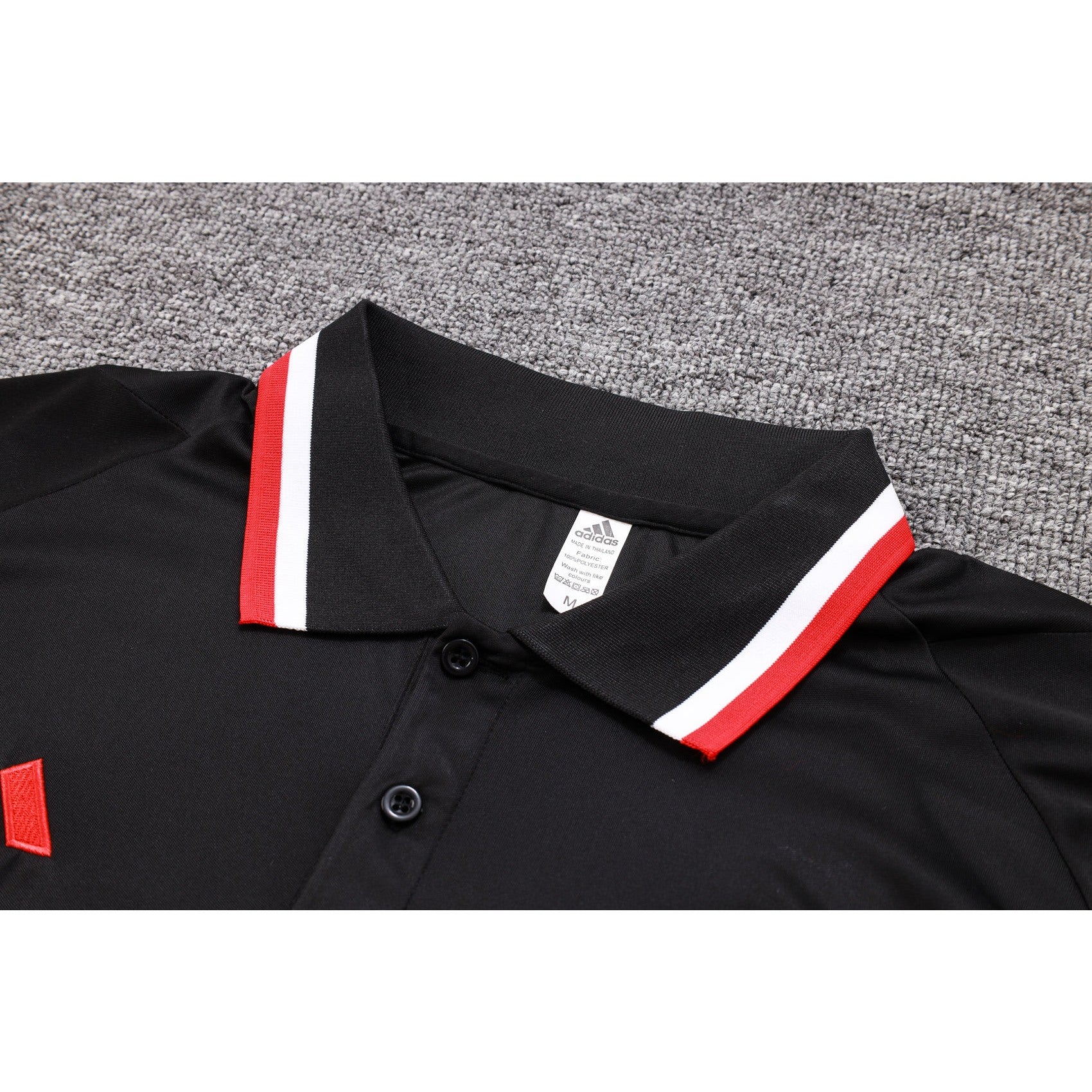 NEW MANCHESTER UNITED 1º TRACKSUIT POLO 23/24
