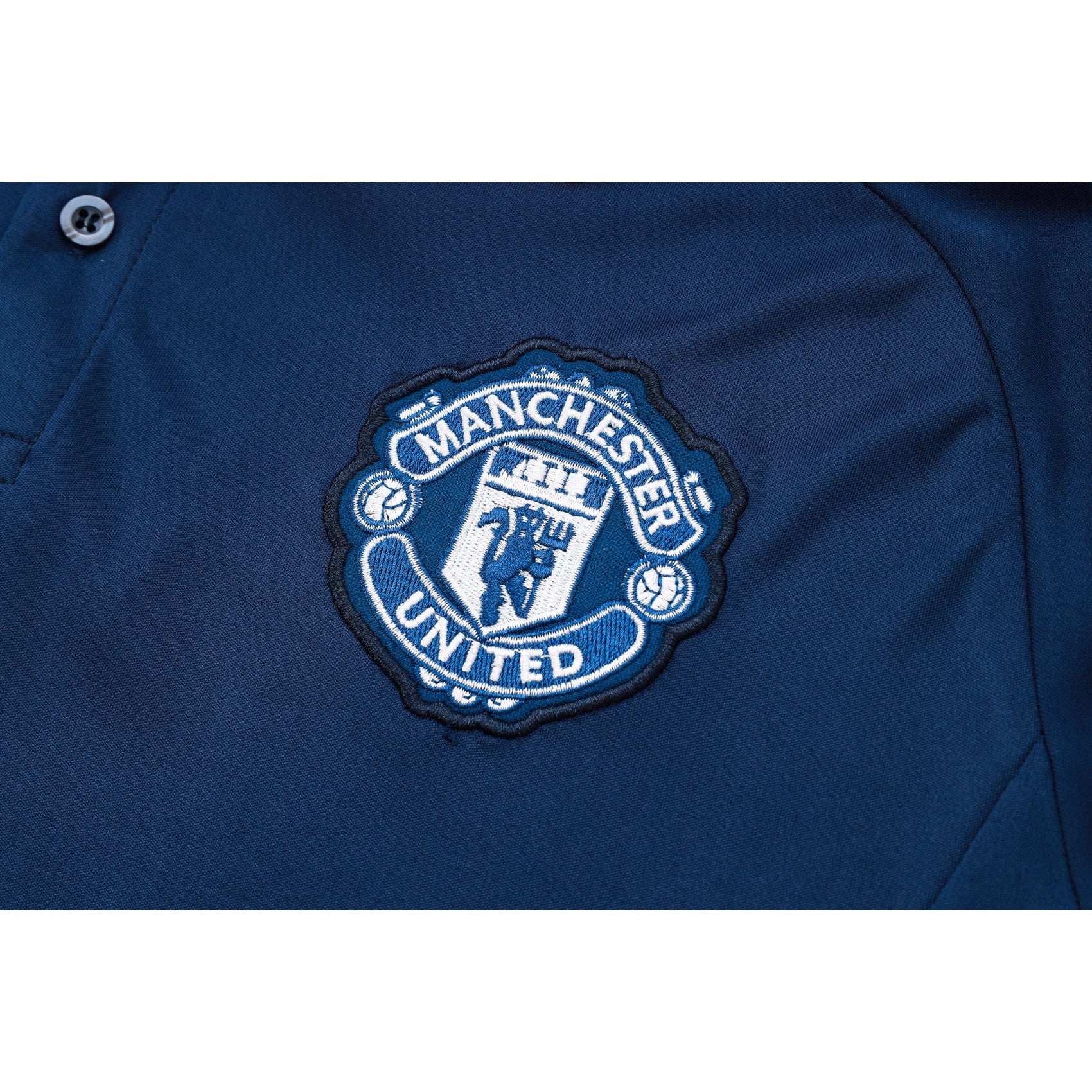 NEW MANCHESTER UNITED TRACKSUIT POLO 24/25
