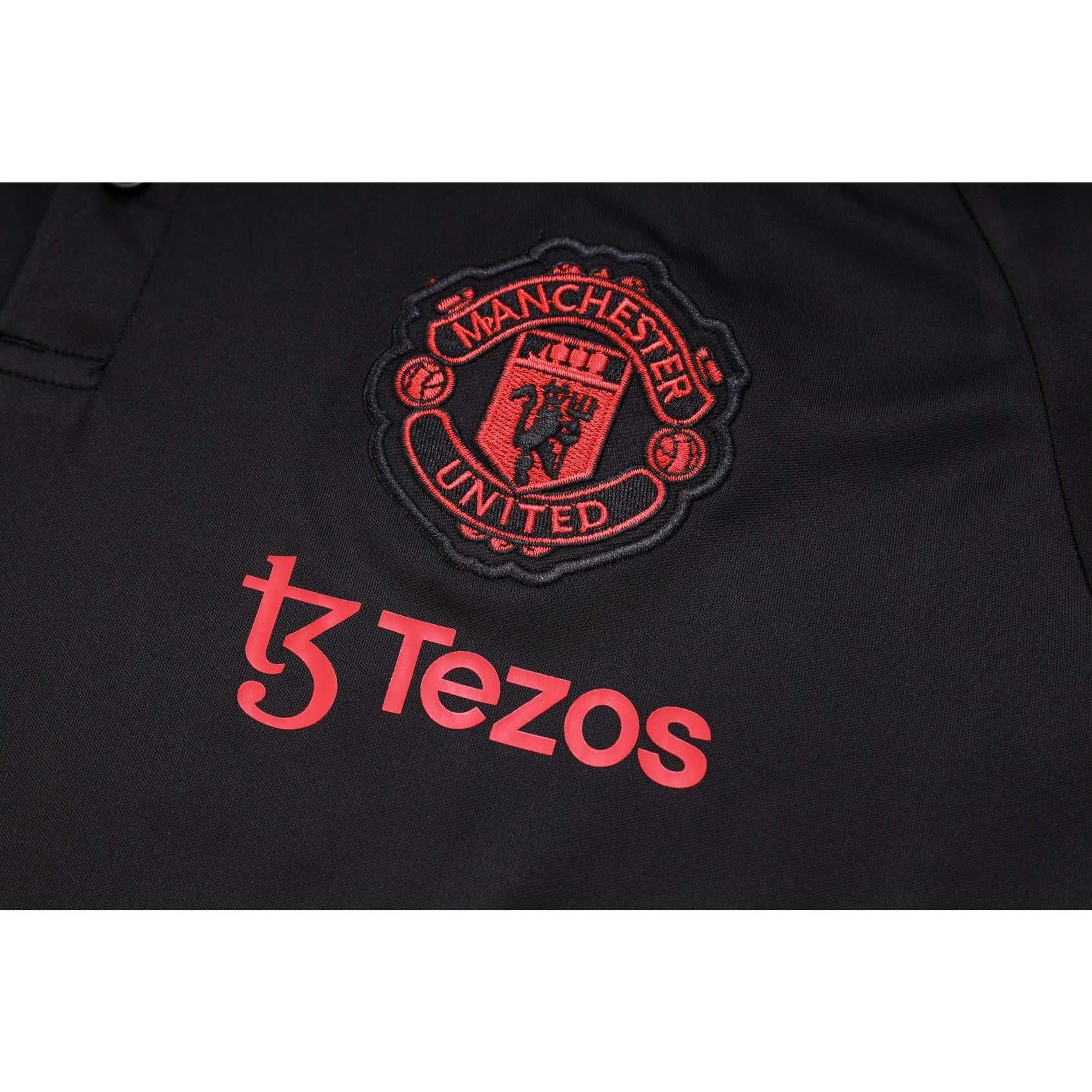 NEW MANCHESTER UNITED 1º TRACKSUIT POLO 23/24