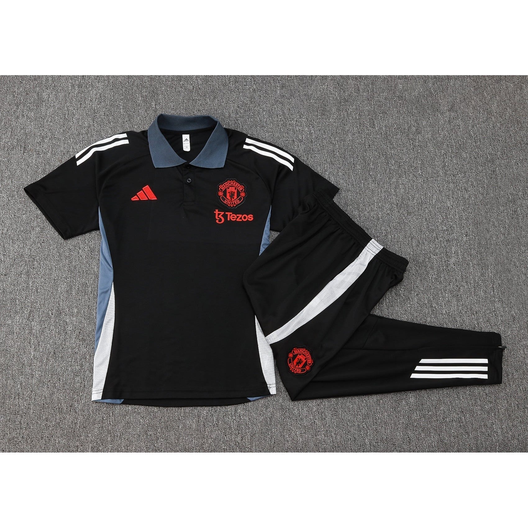NEW MANCHESTER UNITED TRACKSUIT POLO 2º 24/25