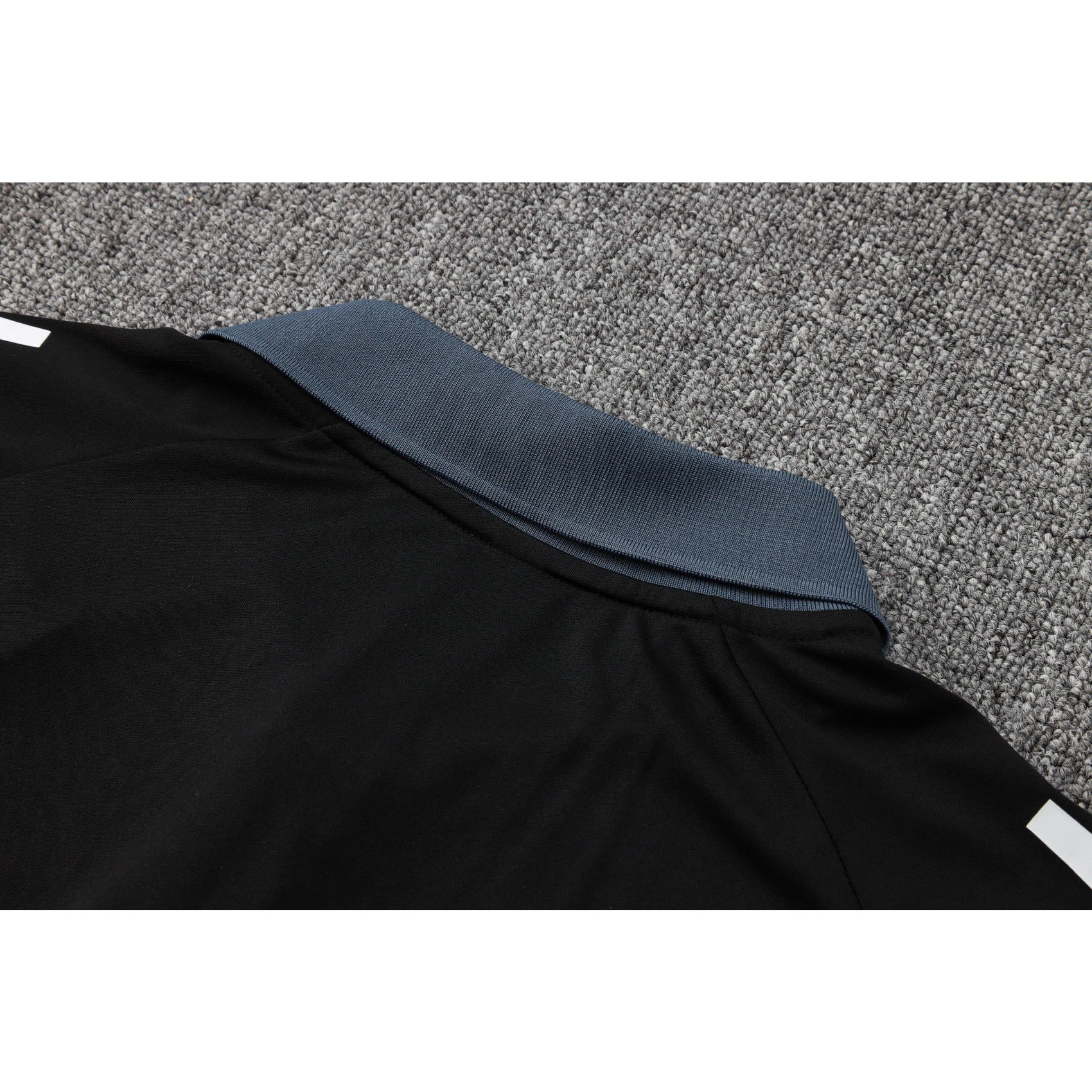 NEW MANCHESTER UNITED TRACKSUIT POLO 2º 24/25