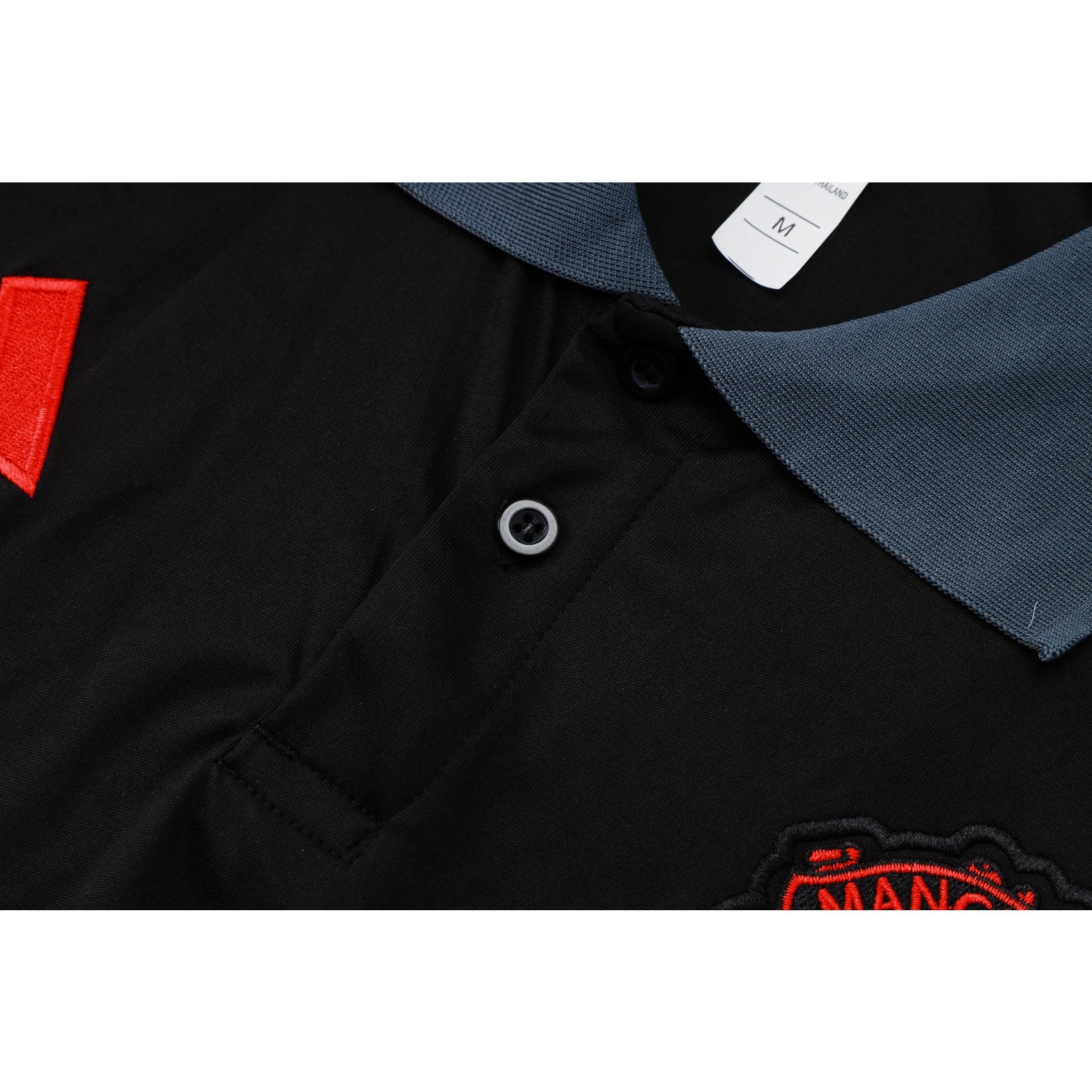 NEW MANCHESTER UNITED TRACKSUIT POLO 2º 24/25