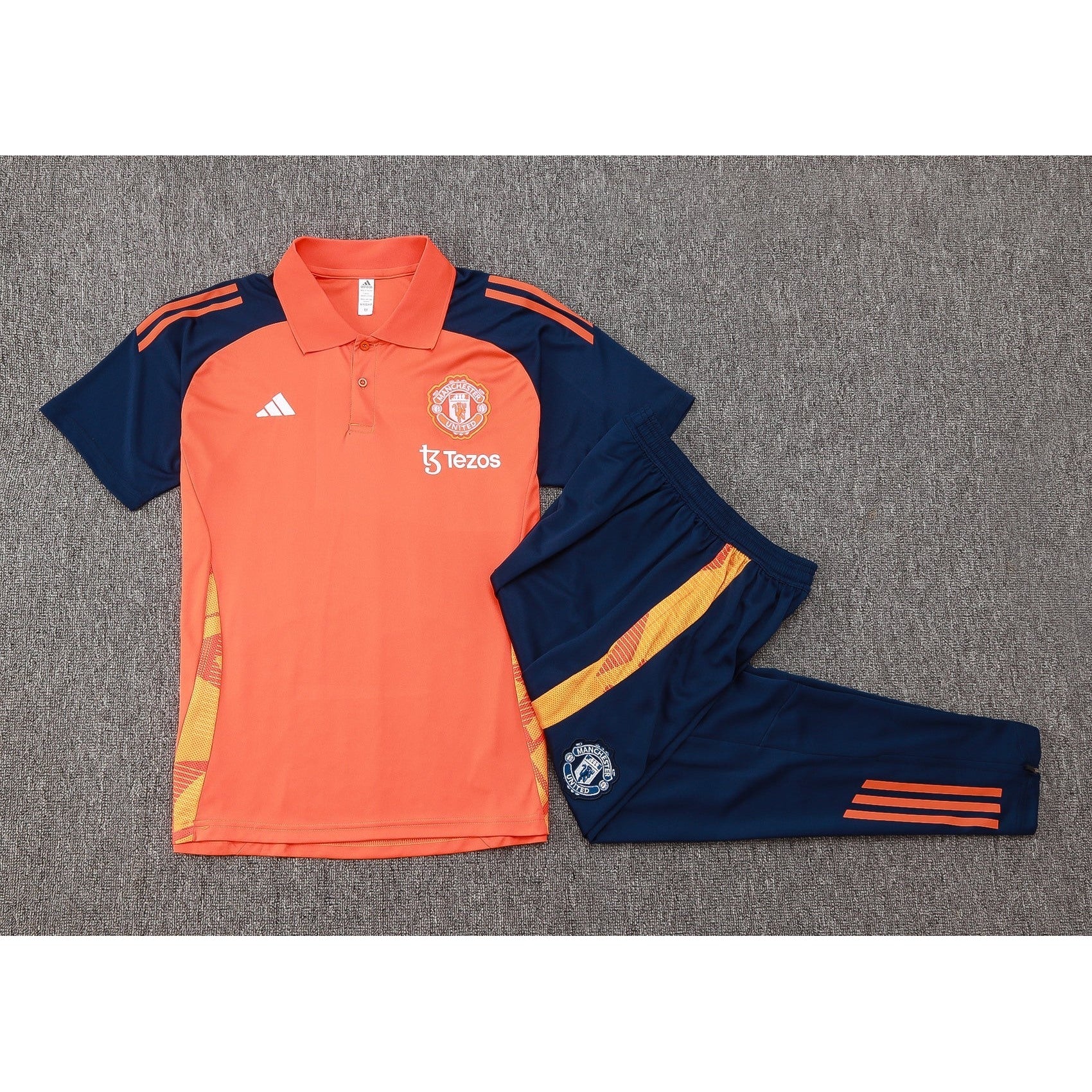 NEW MANCHESTER UNITED TRACKSUIT POLO 4º 24/25
