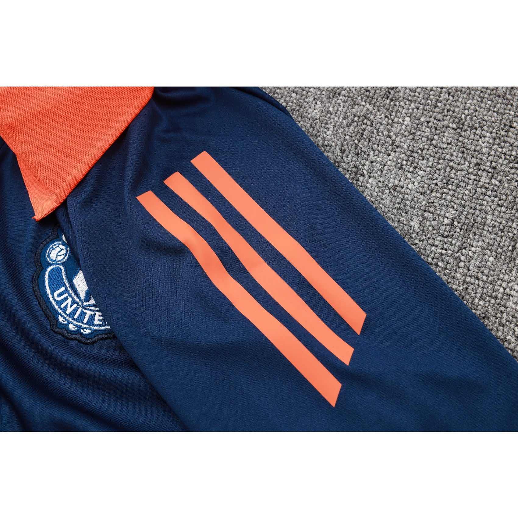 NEW MANCHESTER UNITED TRACKSUIT POLO 24/25
