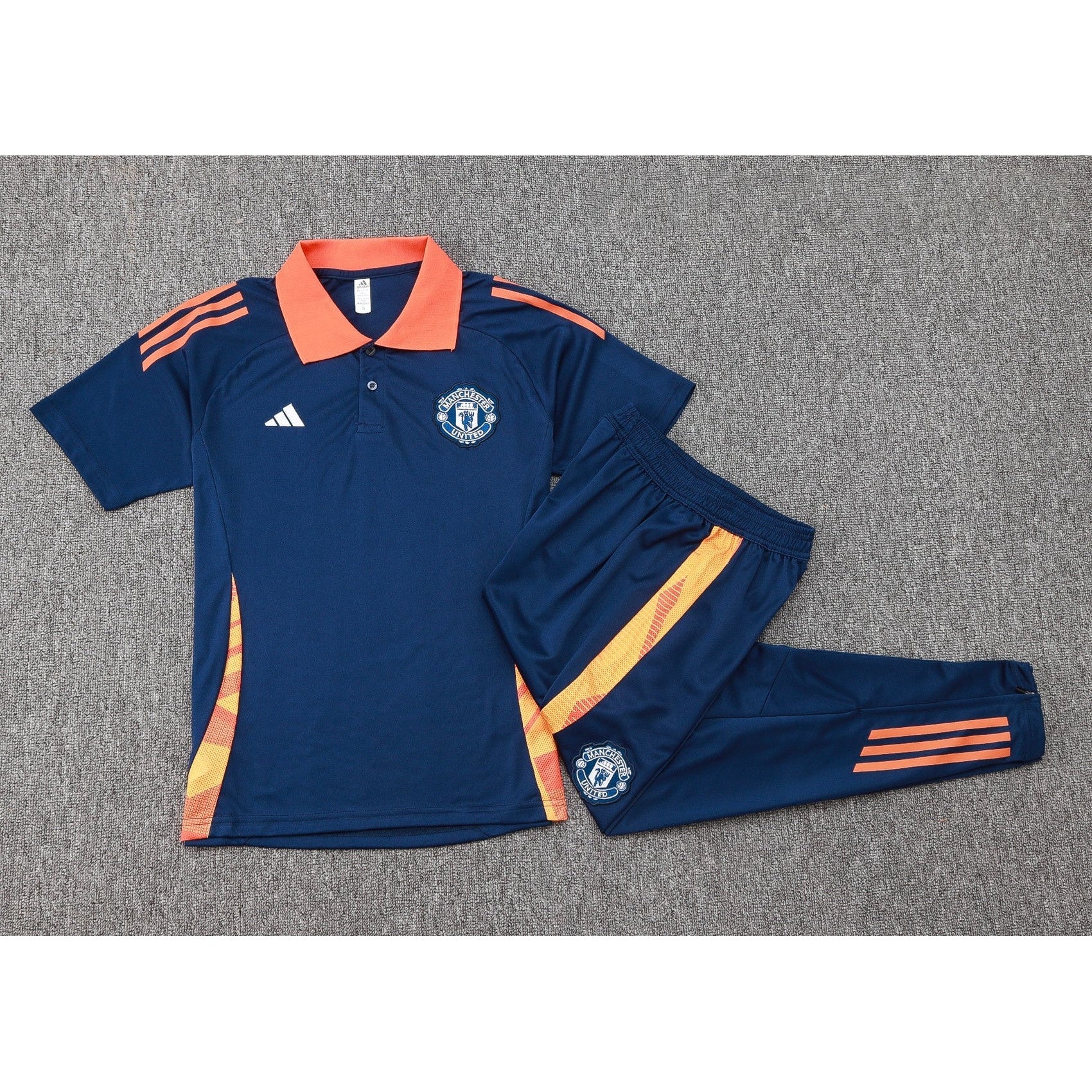NEW MANCHESTER UNITED TRACKSUIT POLO 24/25