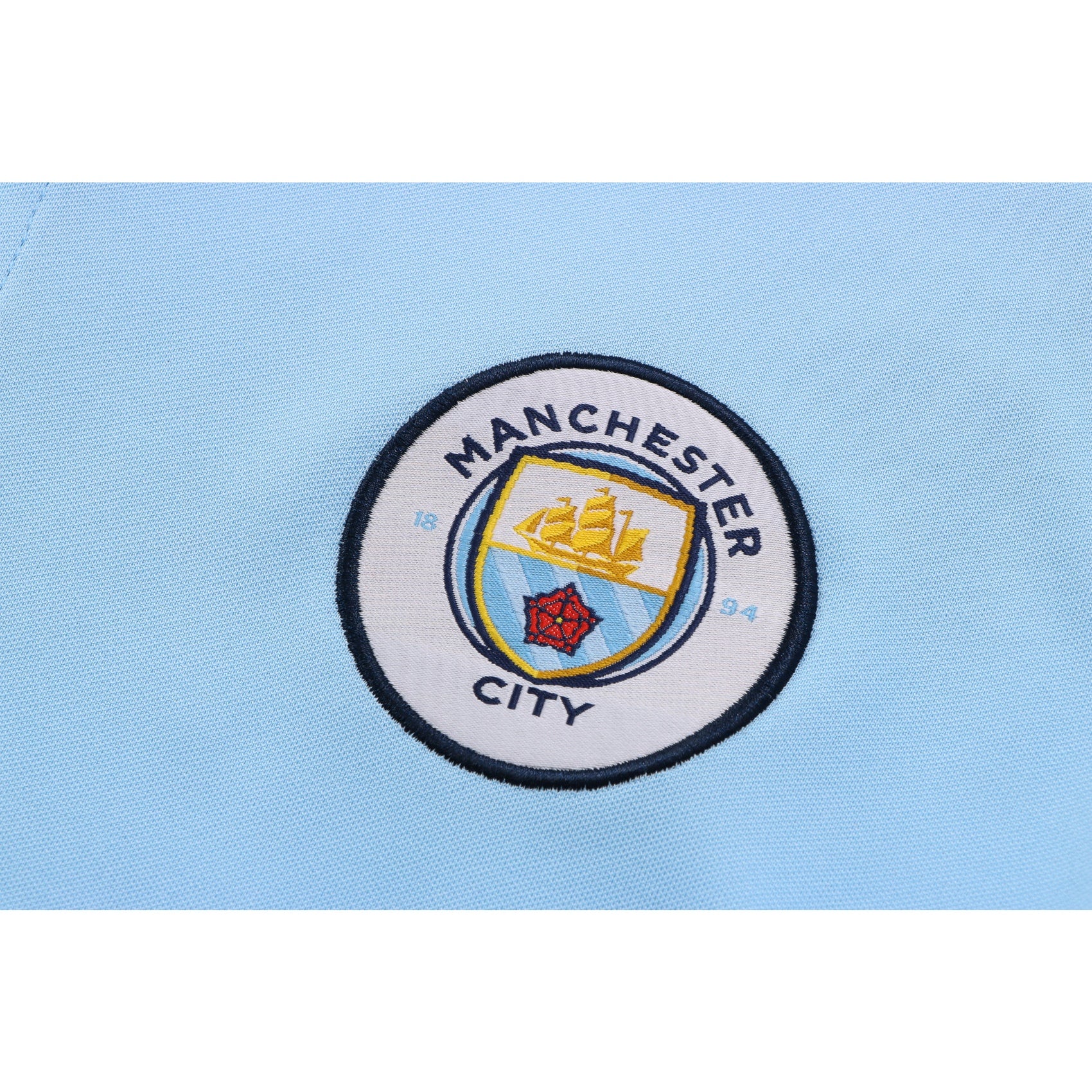 NEW MANCHESTER CITY TRACKSUIT POLO