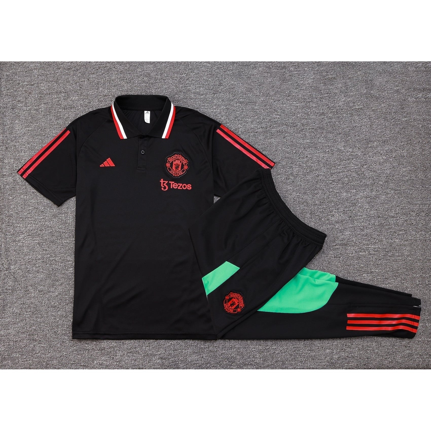 NEW MANCHESTER UNITED 1º TRACKSUIT POLO 23/24