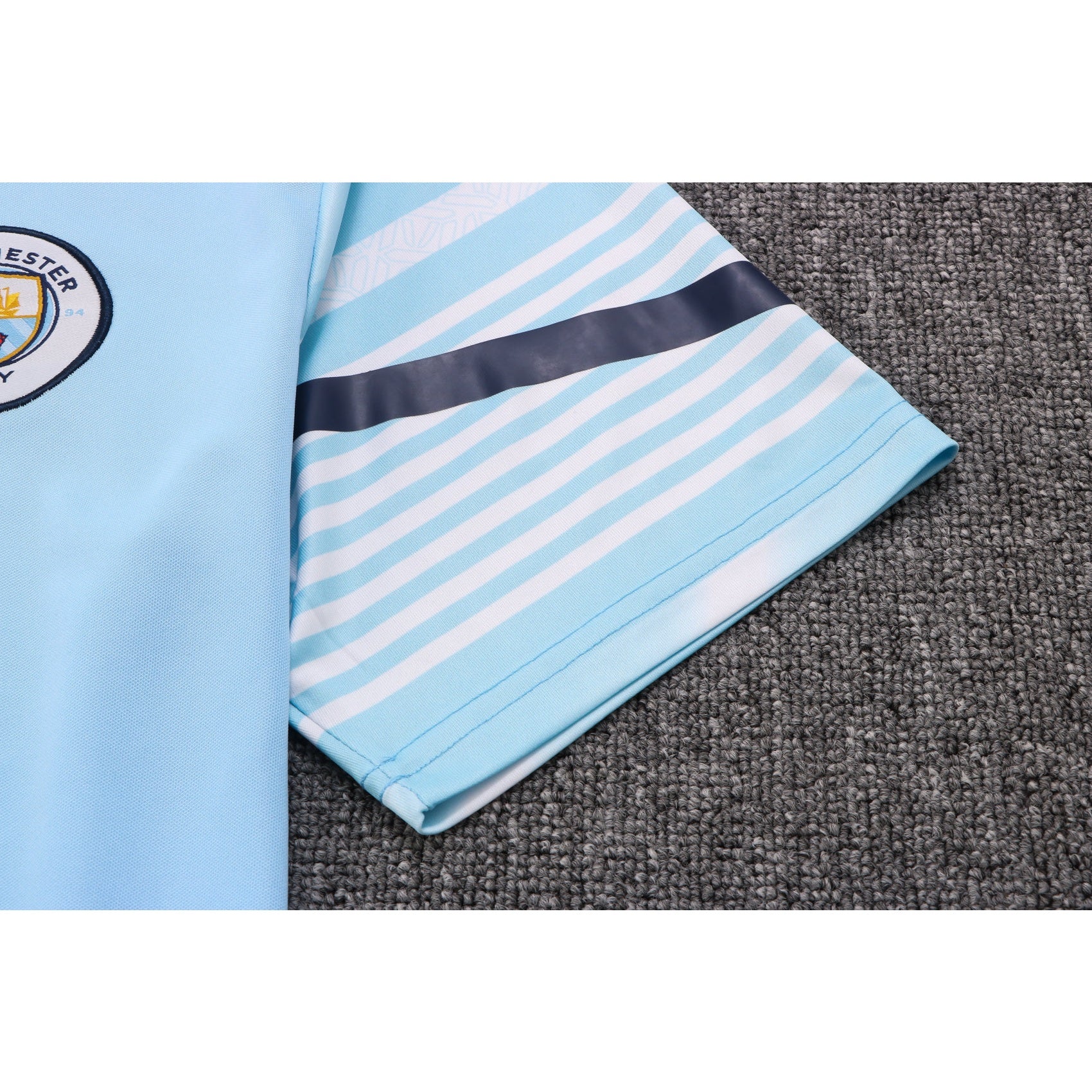 NEW MANCHESTER CITY TRACKSUIT POLO